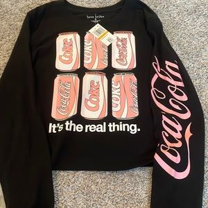 COCA COLA GRAPHIC TEE🥤 
Pink and white design 💕🤍
NEW WITH TAGS
BLACK SHIRT🖤